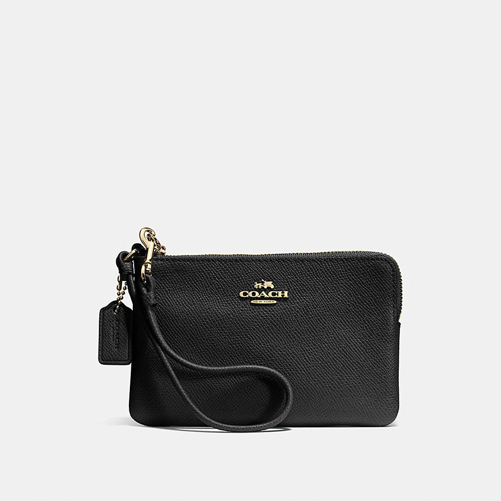 COACH: Embossed Small Corner Zip Wristlet in Leather