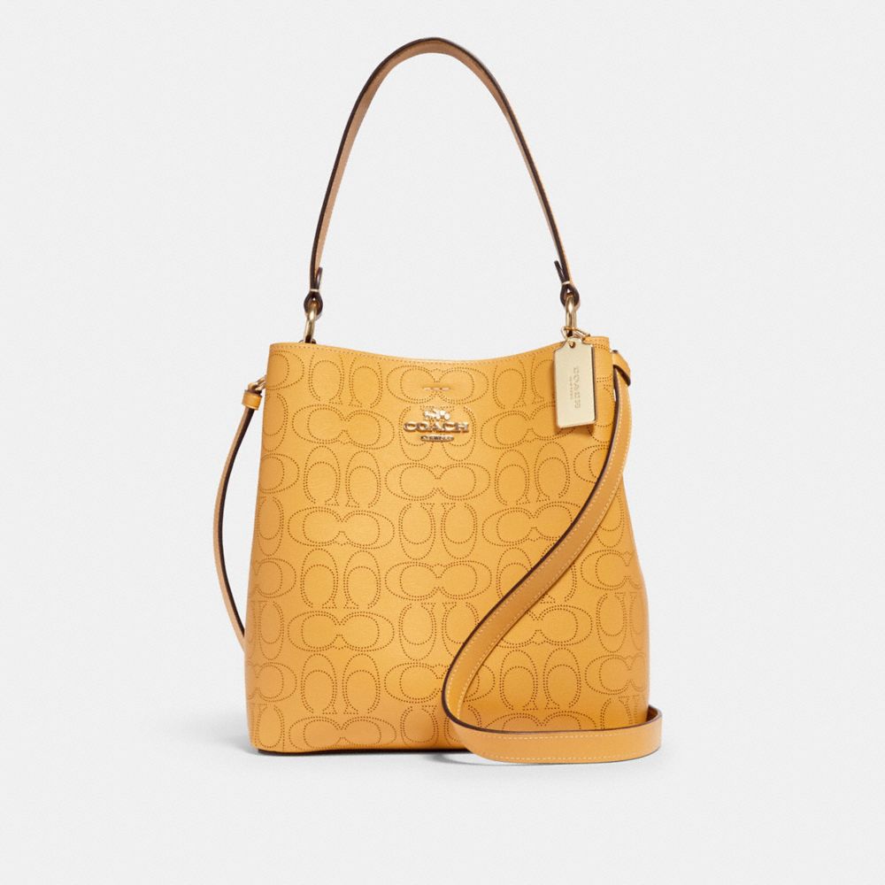 yellow coach handbag