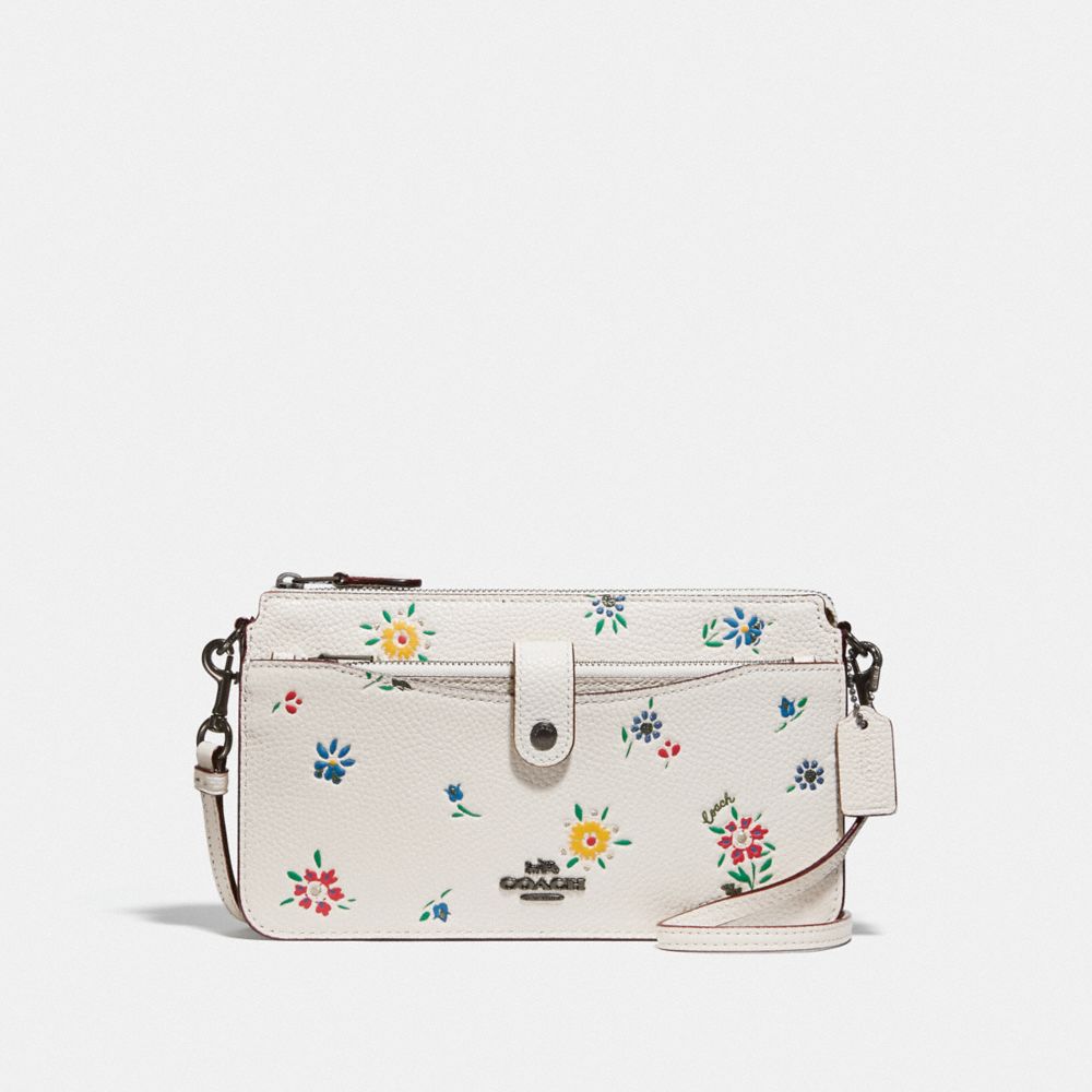 noa pop up messenger coach