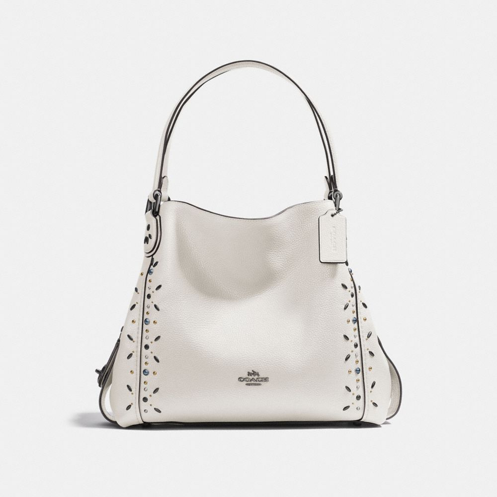 edie shoulder bag 31 in signature leather with rivets