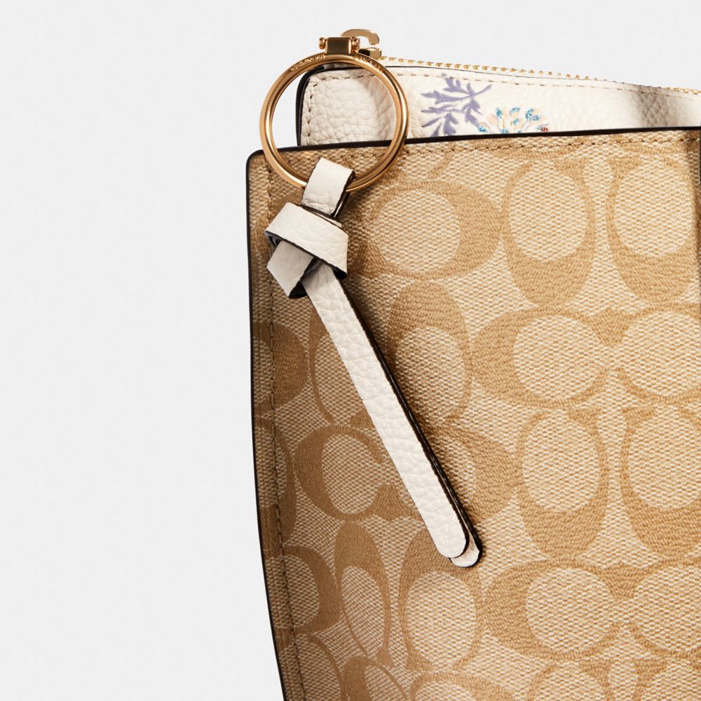 MAY TOTE IN SIGNATURE CANVAS WITH DANDELION FLORAL PRINT | COACH® Outlet