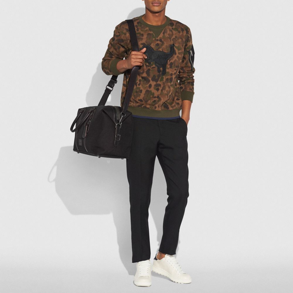 coach explorer bag