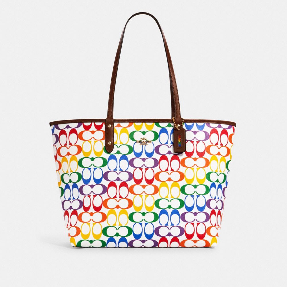 reversible city tote in signature canvas