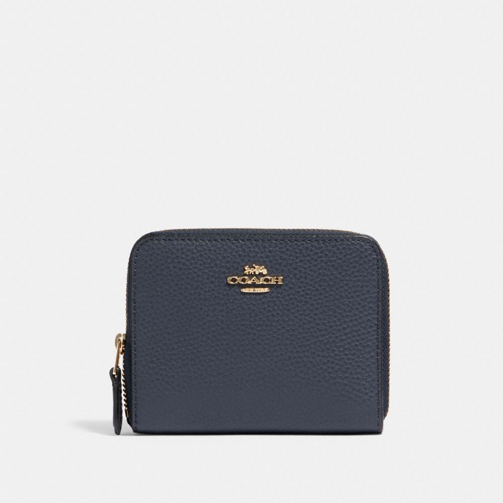 coach pouch wallet price