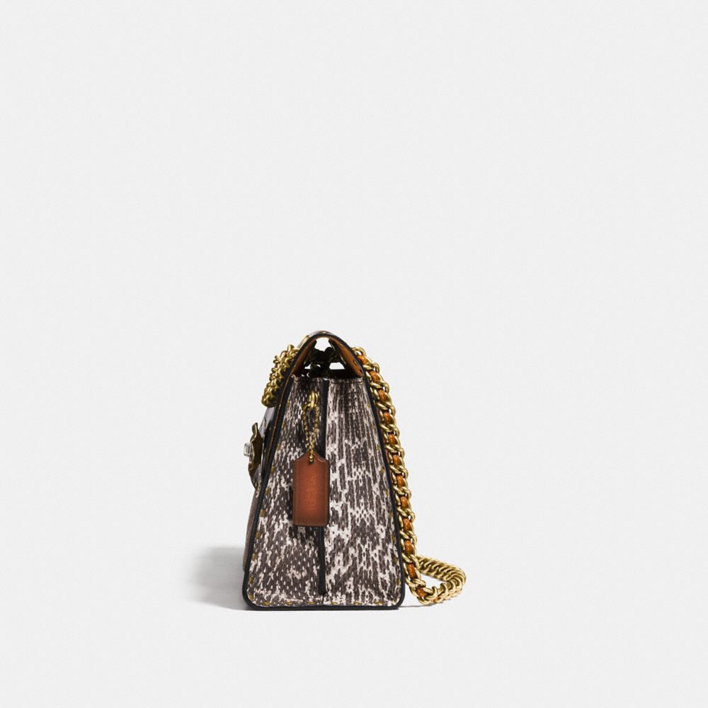 coach parker with rivets and snakeskin detail