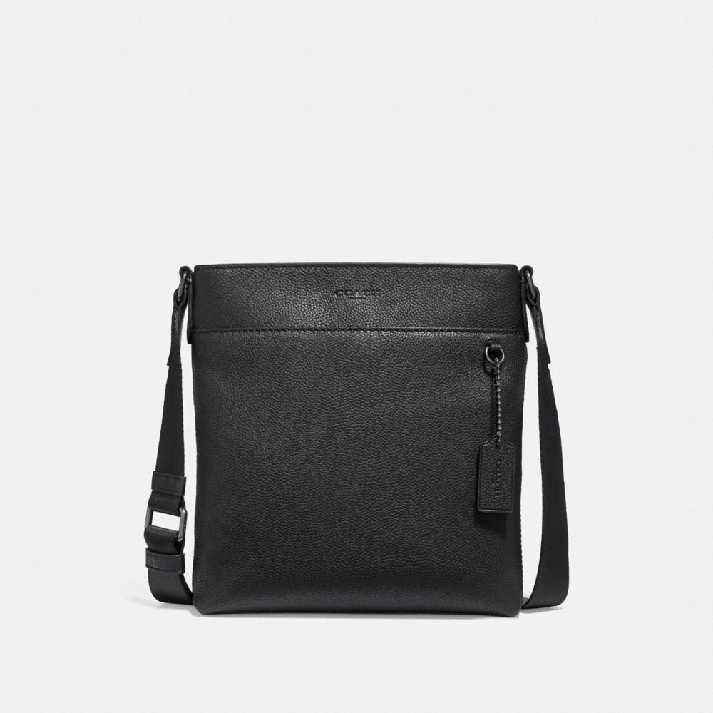 black canvas coach messenger bag with green inside