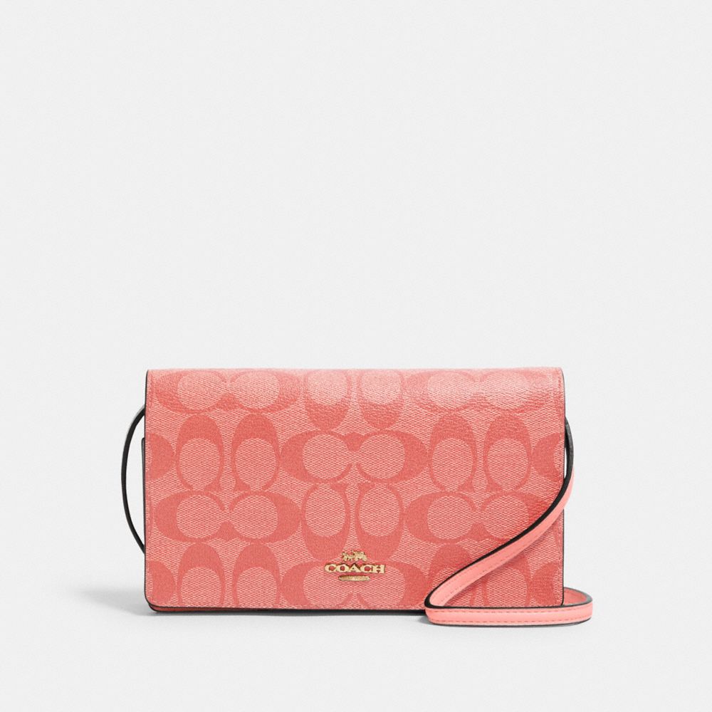 COACH: Anna Foldover Crossbody Clutch In Signature Canvas