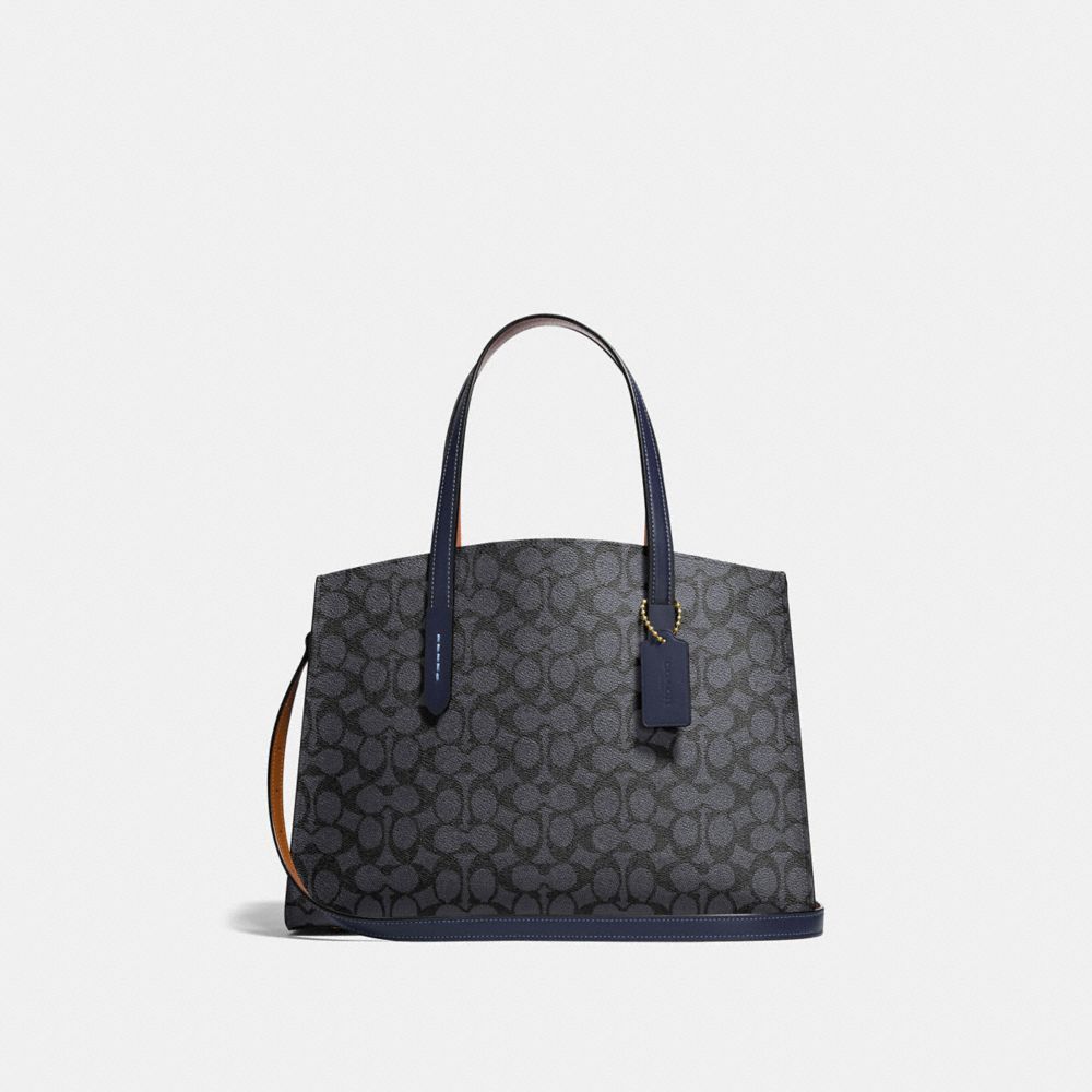 coach charlie signature canvas carryall tote