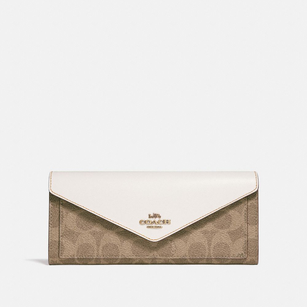 tan coach wallet