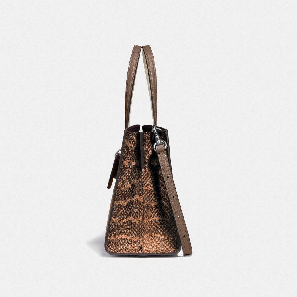 coach charlie carryall snakeskin