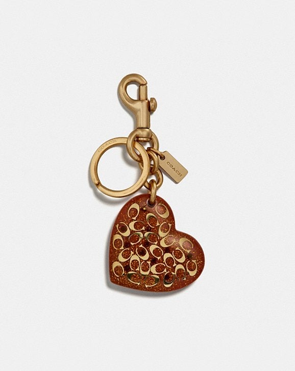 ONLINE ONLY signature heart bag charm 60€ Select Your Size Add 
