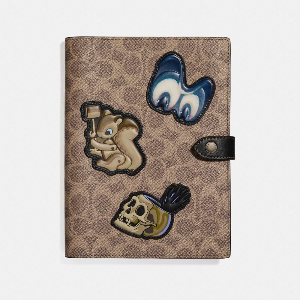 DISNEY X COACH SKETCHBOOK IN SIGNATURE PATCHWORK