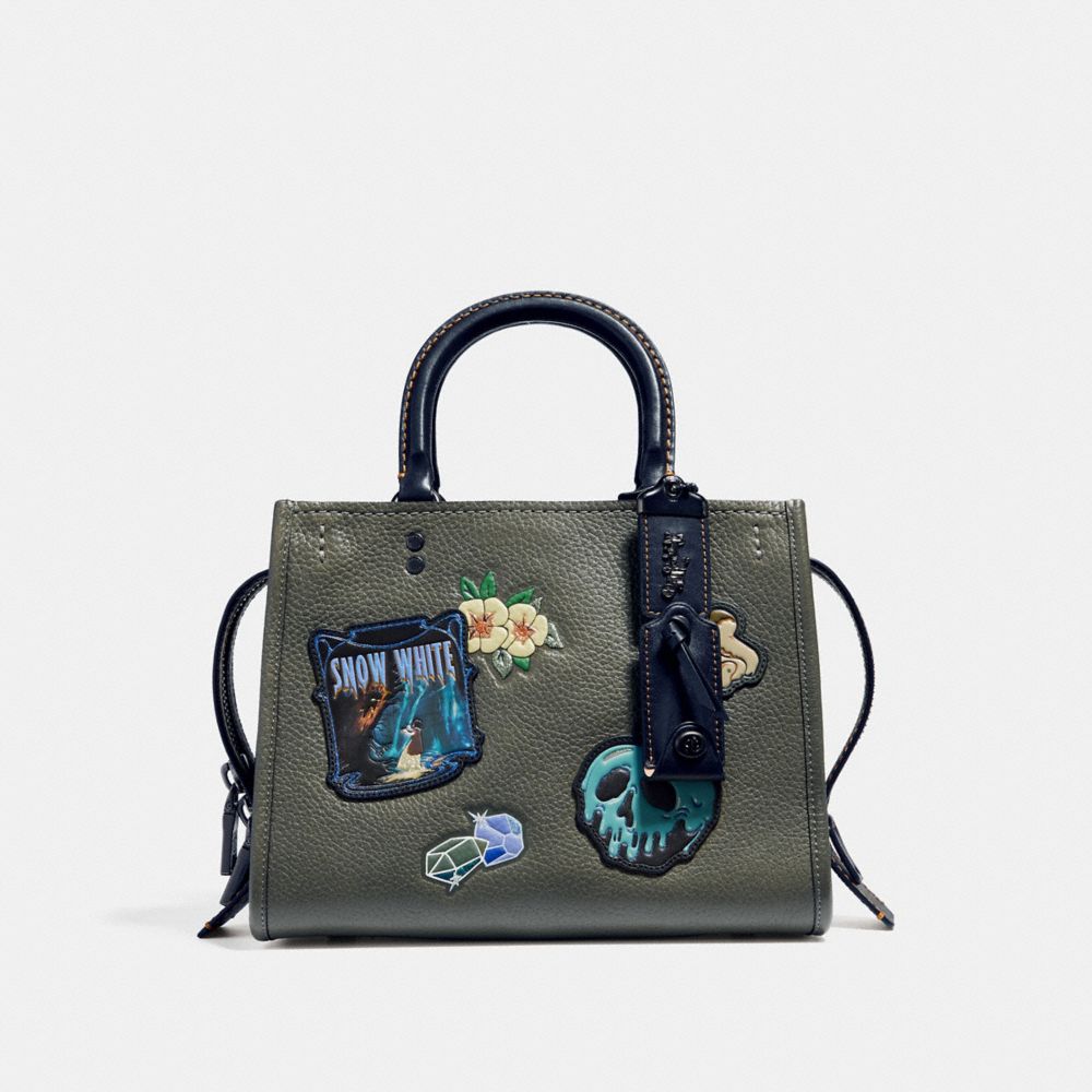 DISNEY X COACH ROGUE 25 WITH PATCHES