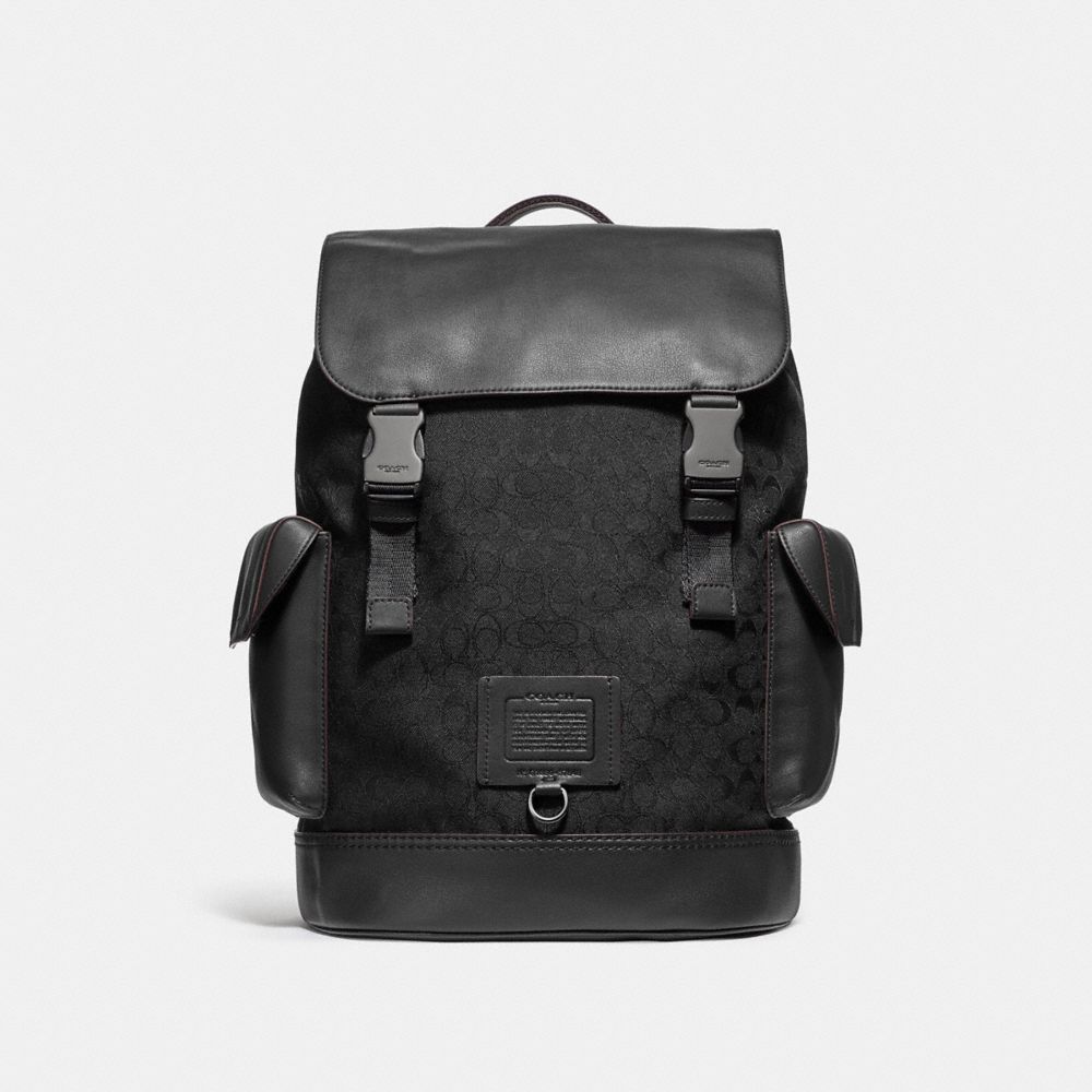 black and grey coach backpack