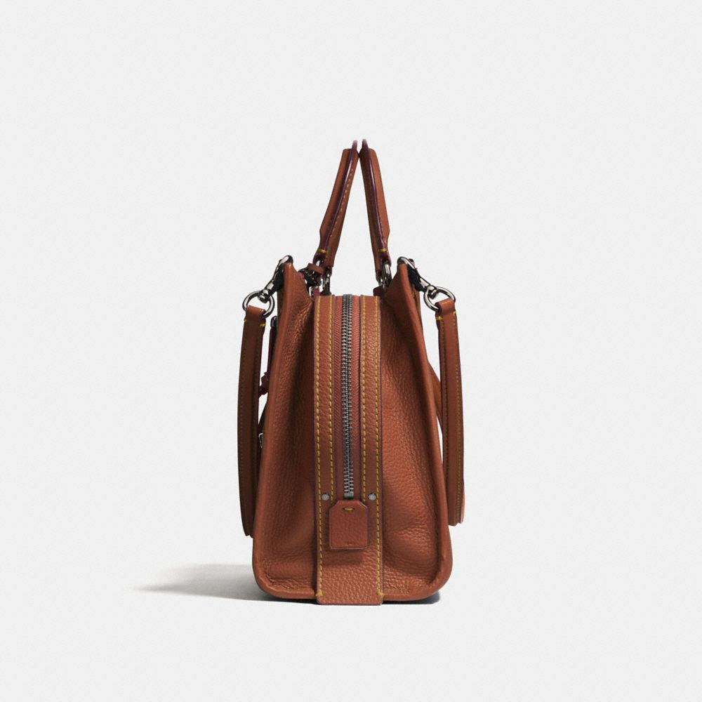 coach rogue oxblood