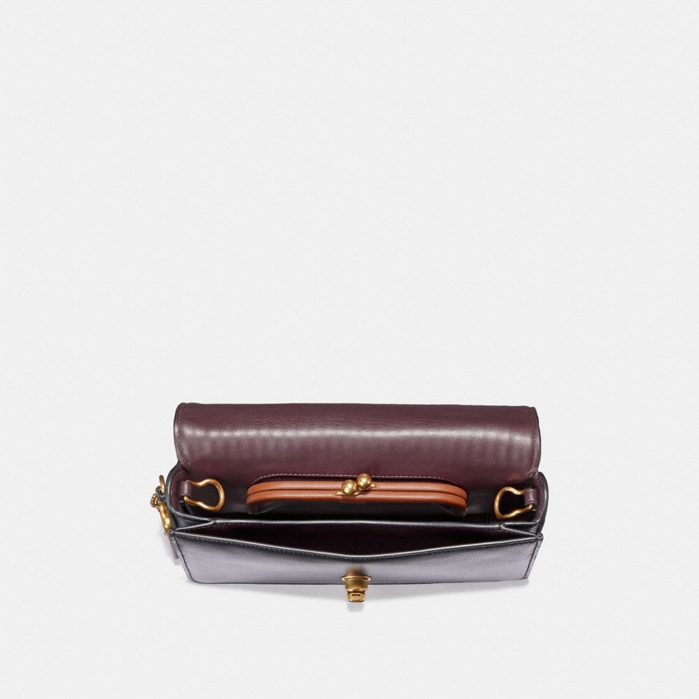 coach dinky quilted black