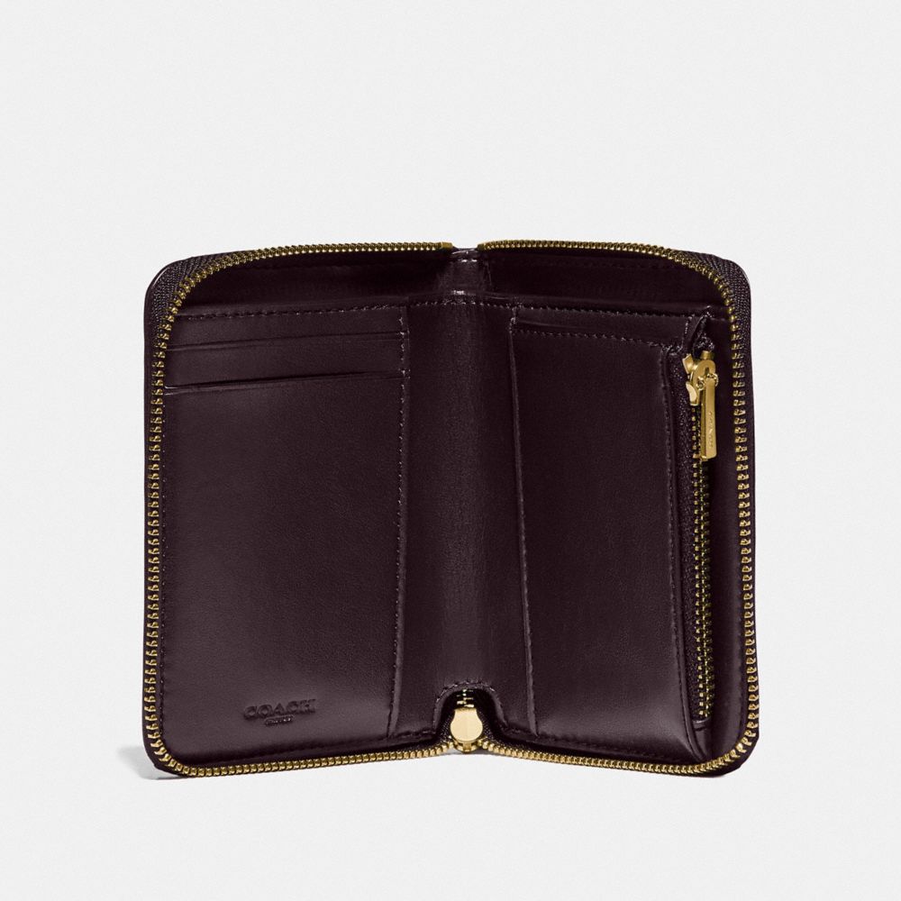 SMALL ZIP AROUND WALLET IN SIGNATURE LEATHER - Alternate View 1
