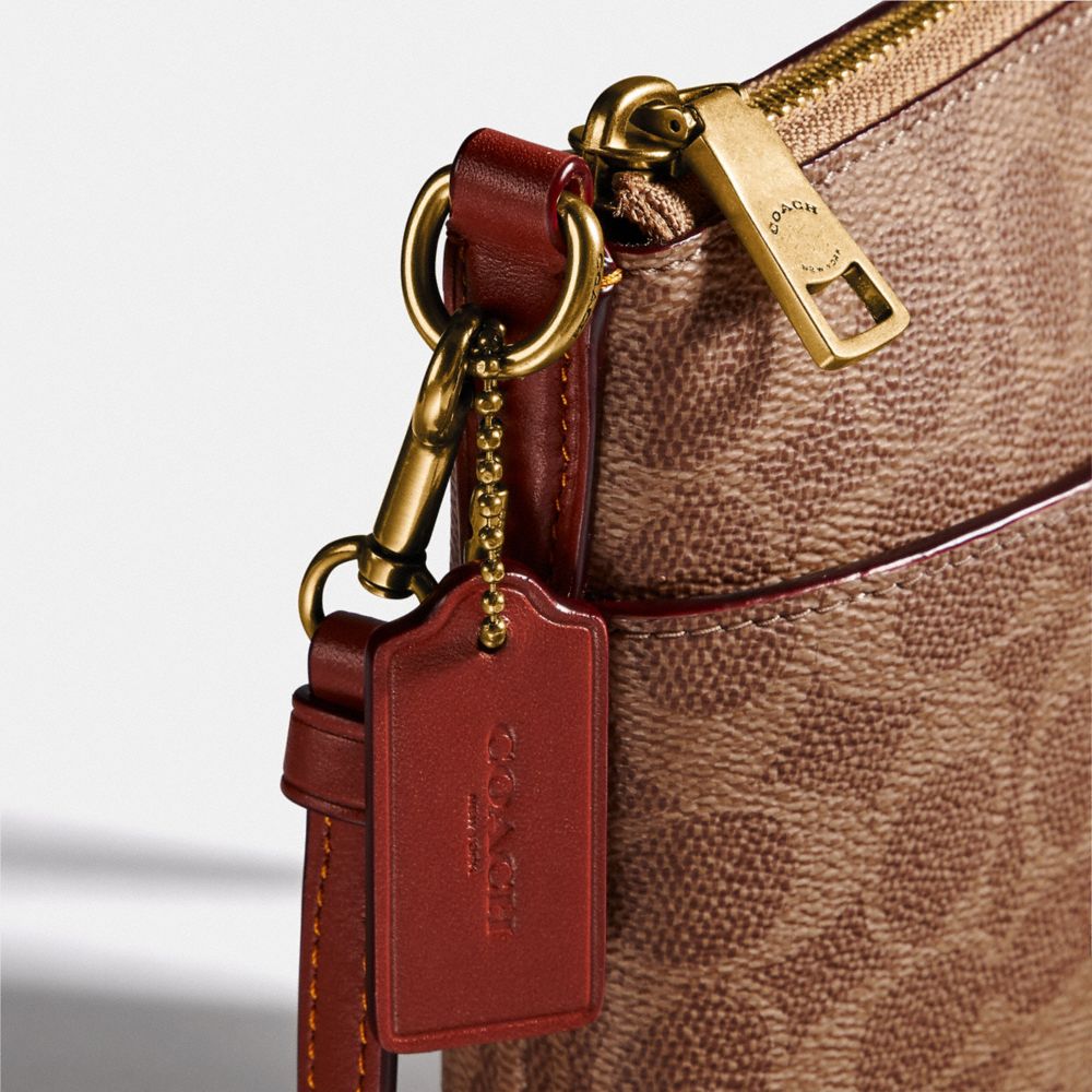 coach signature messenger crossbody