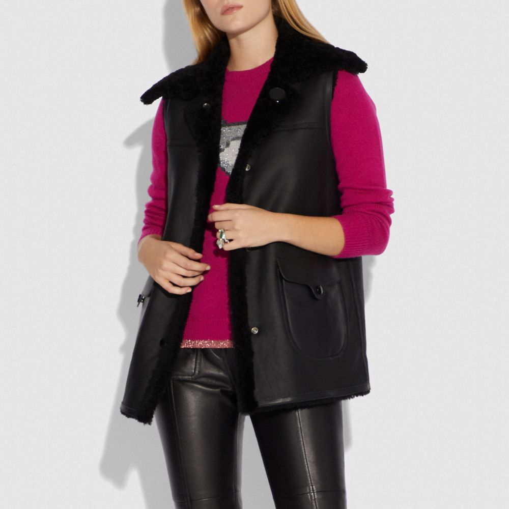 black shearling vest womens