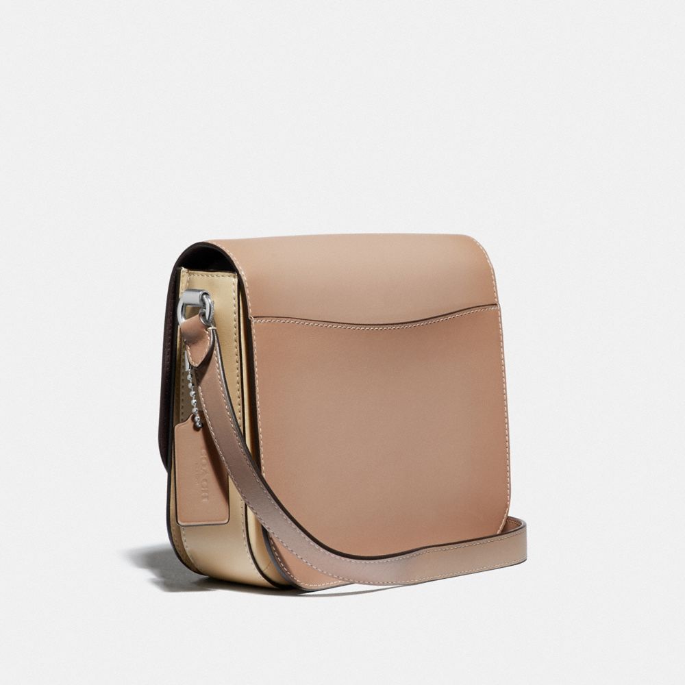 beige saddle bag
