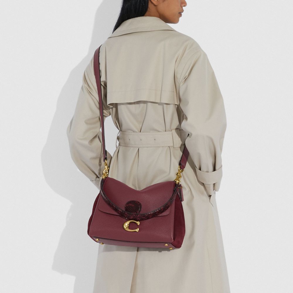 may coach shoulder bag