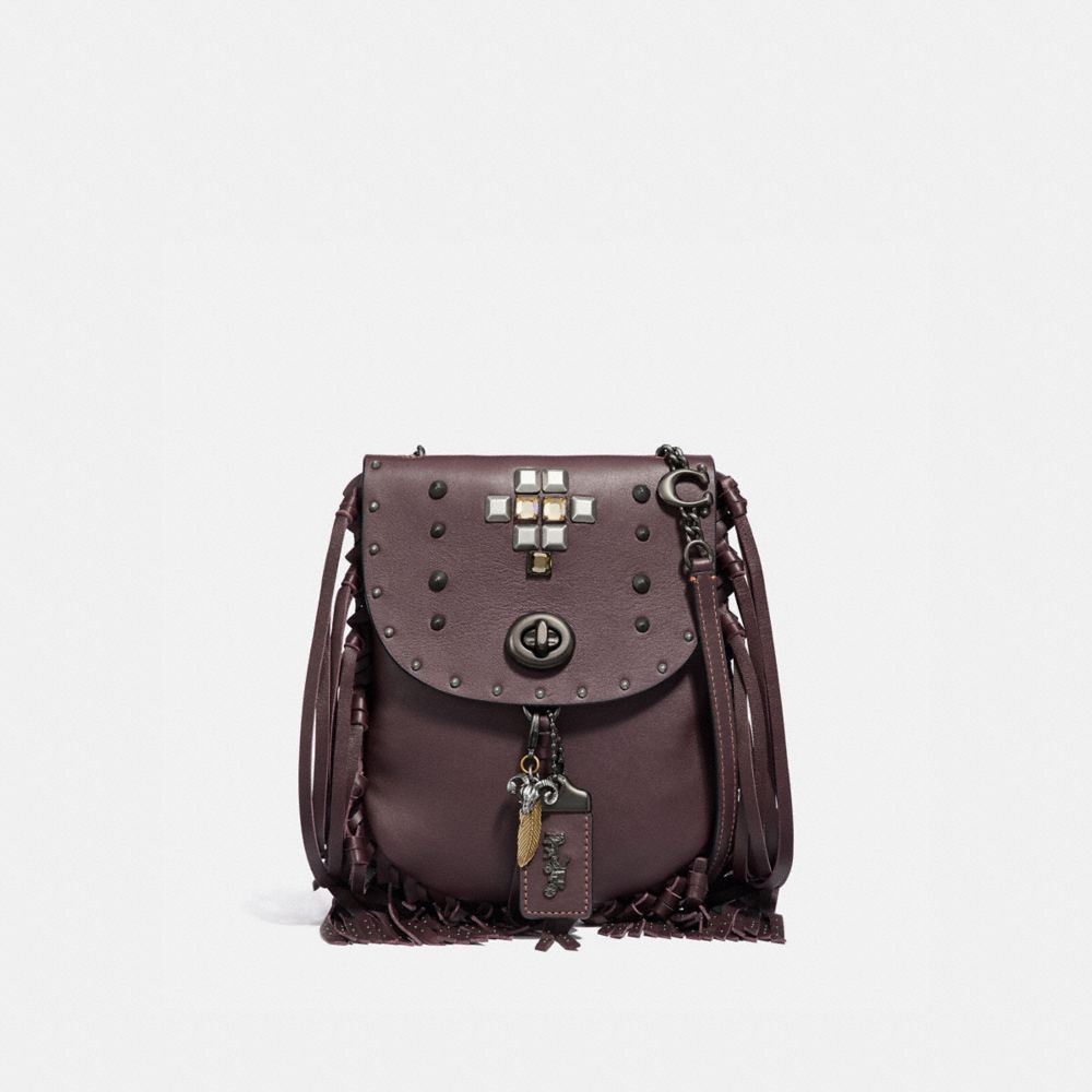 coach fringe saddle bag