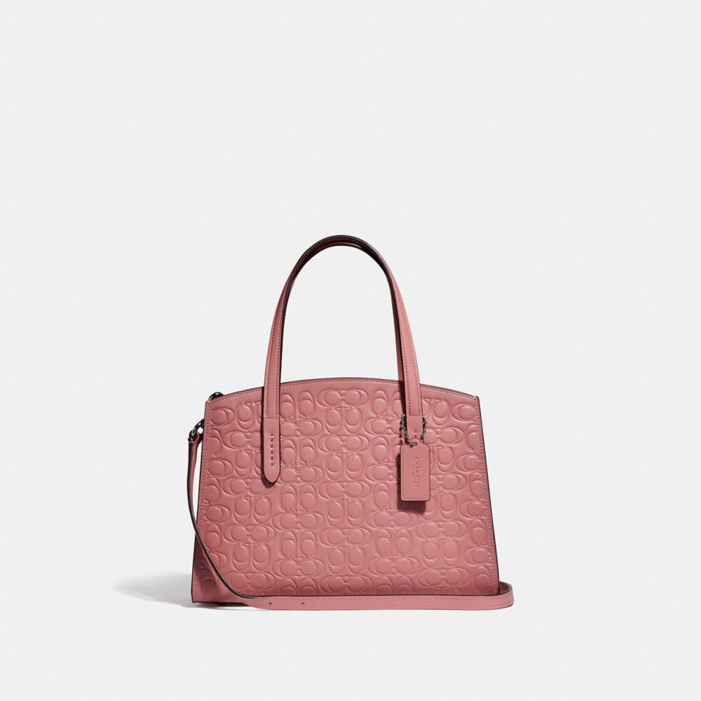 coach charlie carryall pink