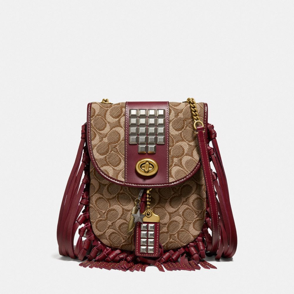 coach fringe saddle bag