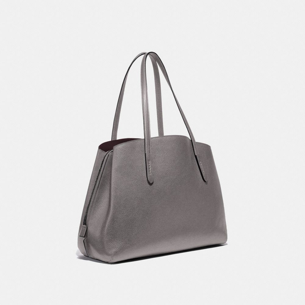 coach polished pebble leather charlie carryall