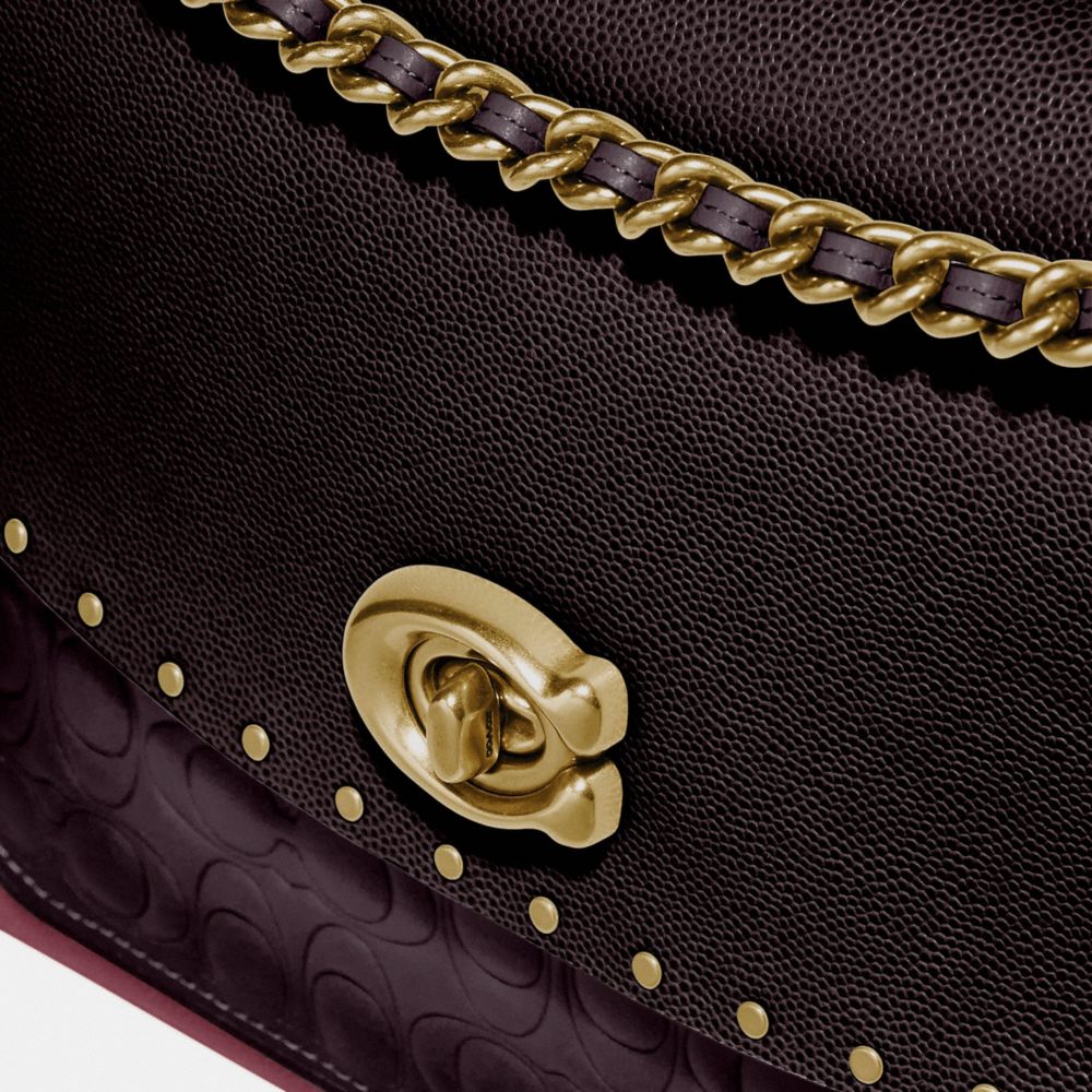 parker in signature leather with rivets