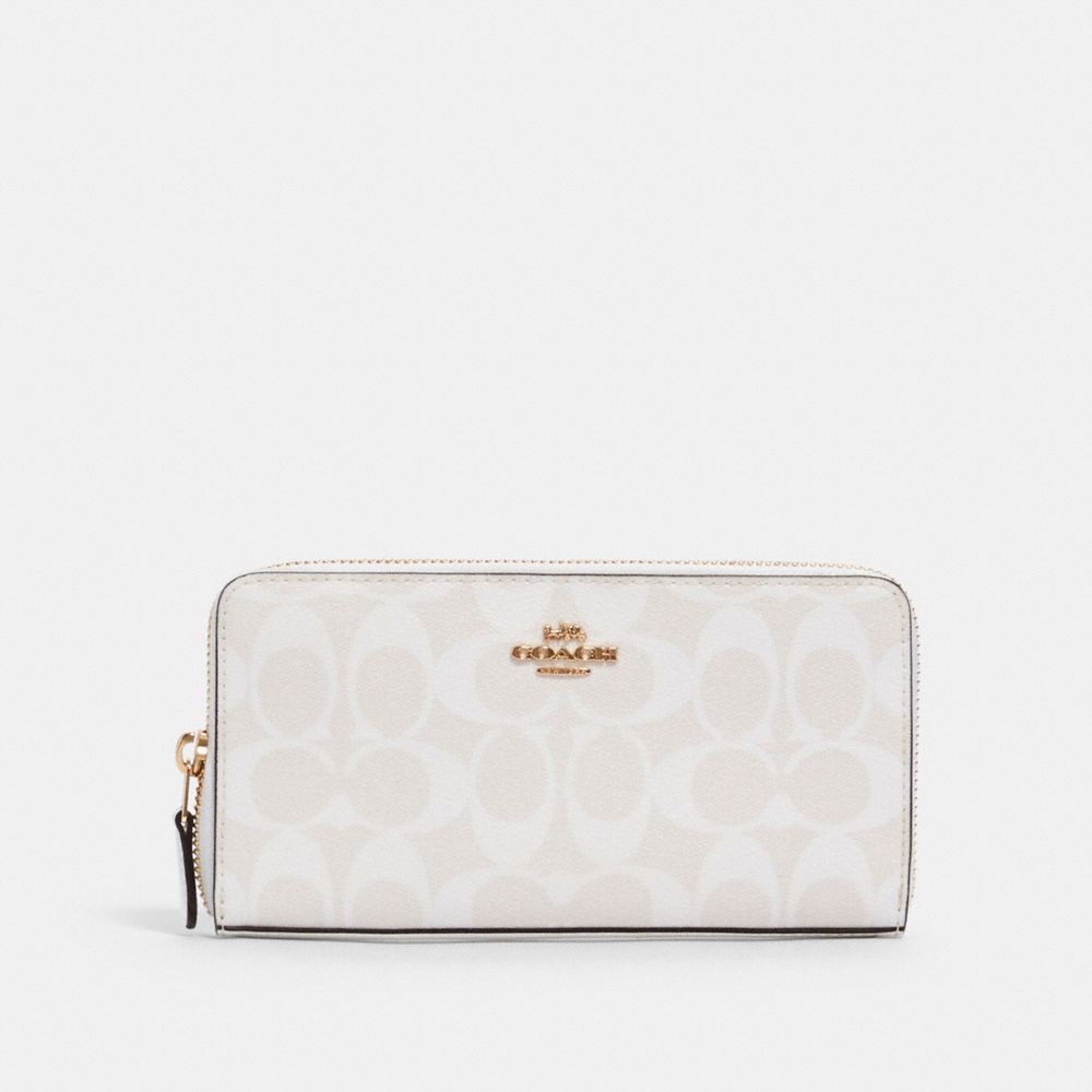 coach wristlet white