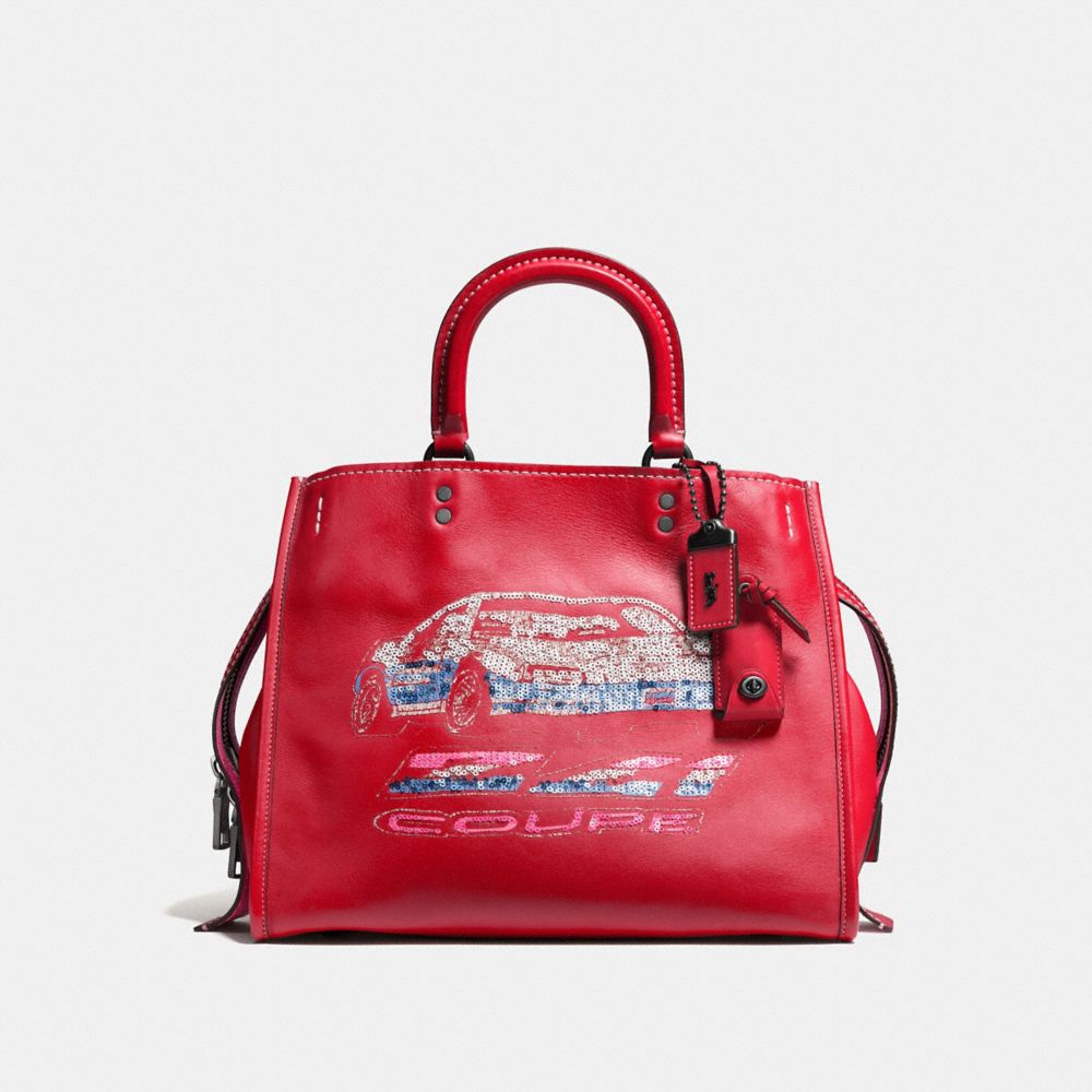 coach black bag with red lining