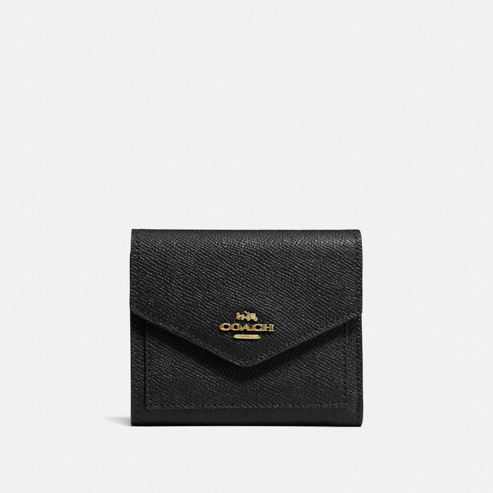 coach pouch wallet price