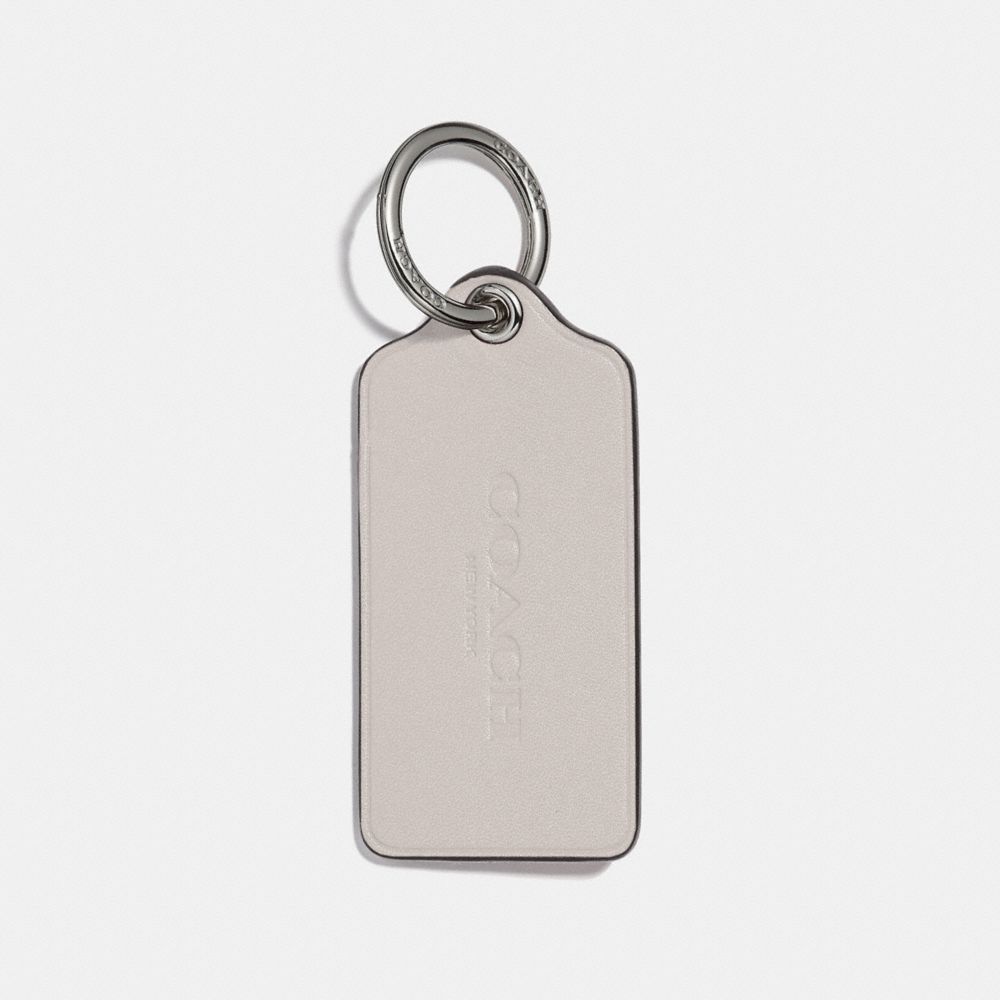 coach gold metal hang tag