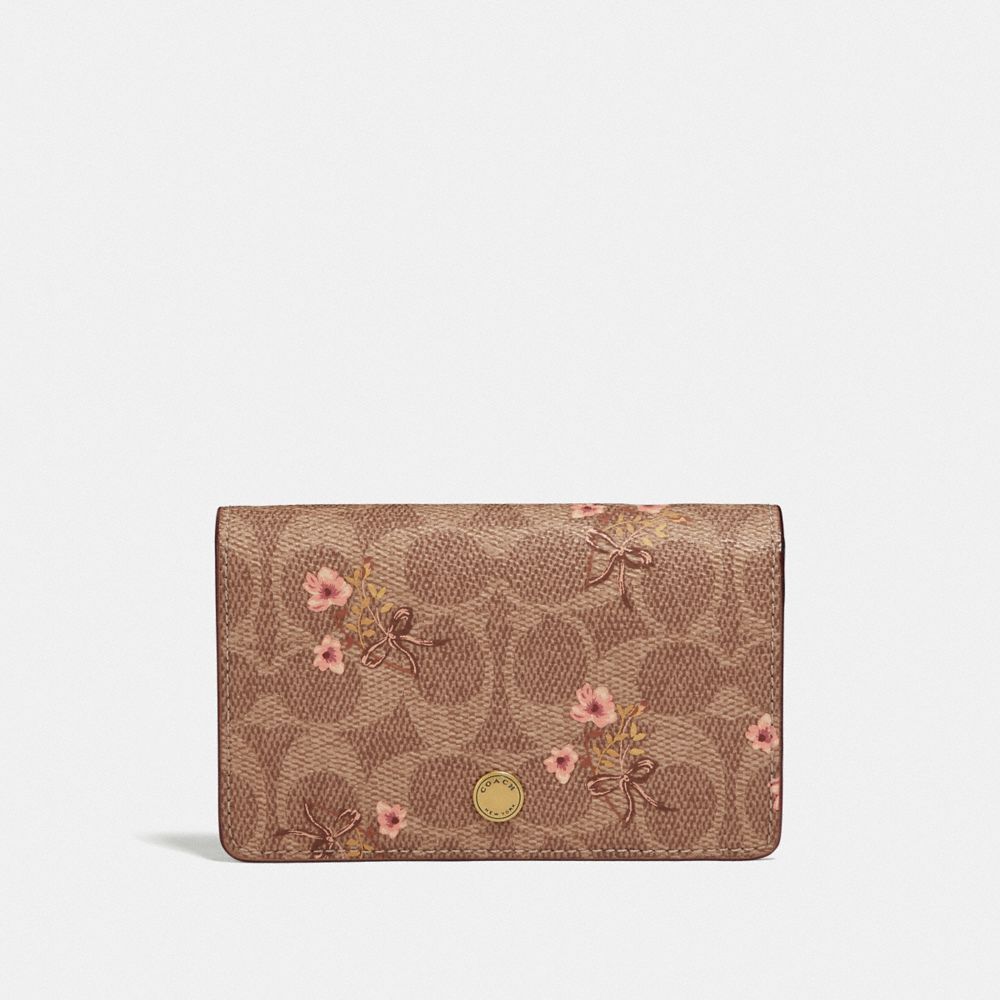 coach floral bow print