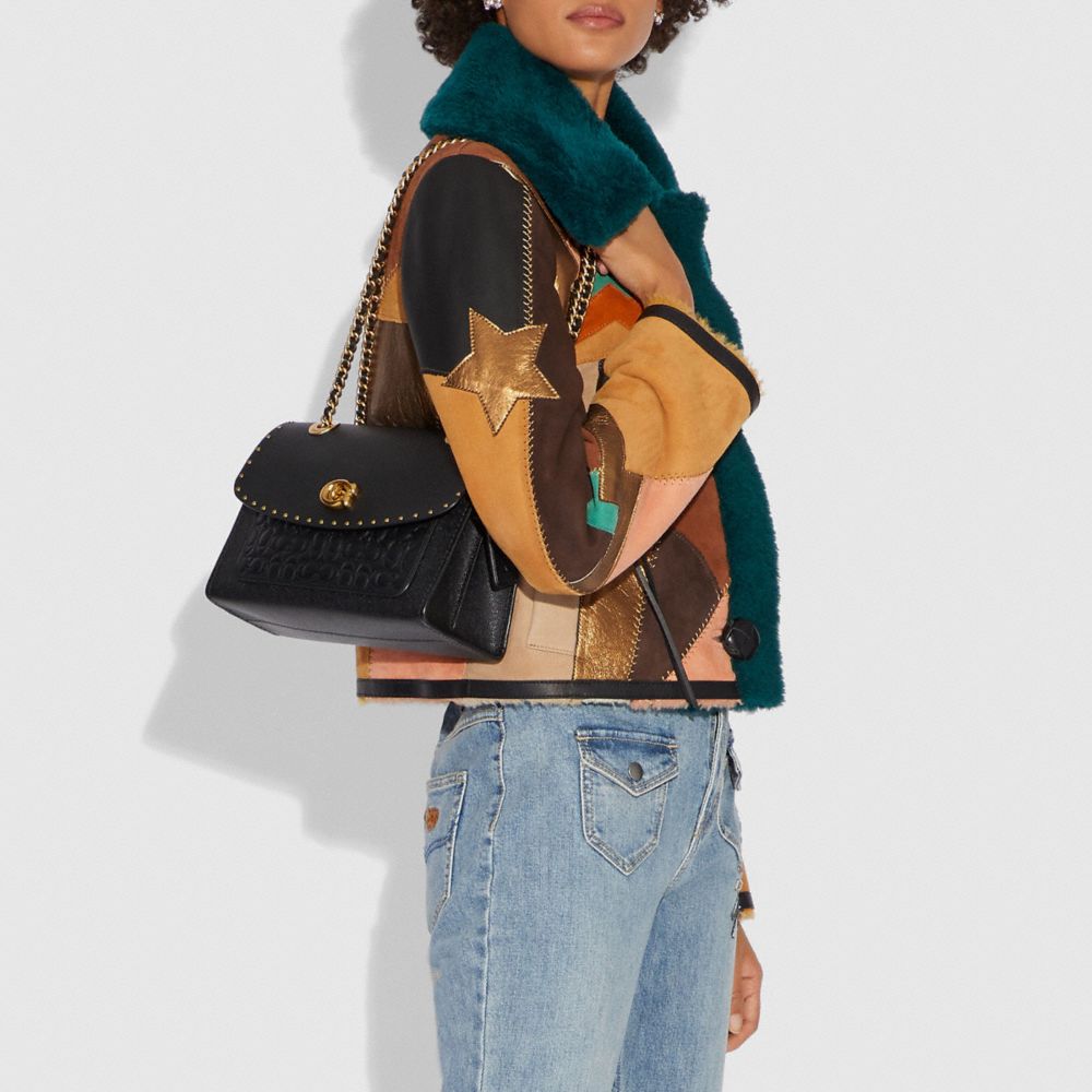 coach parker shoulder bag in signature leather with rivets