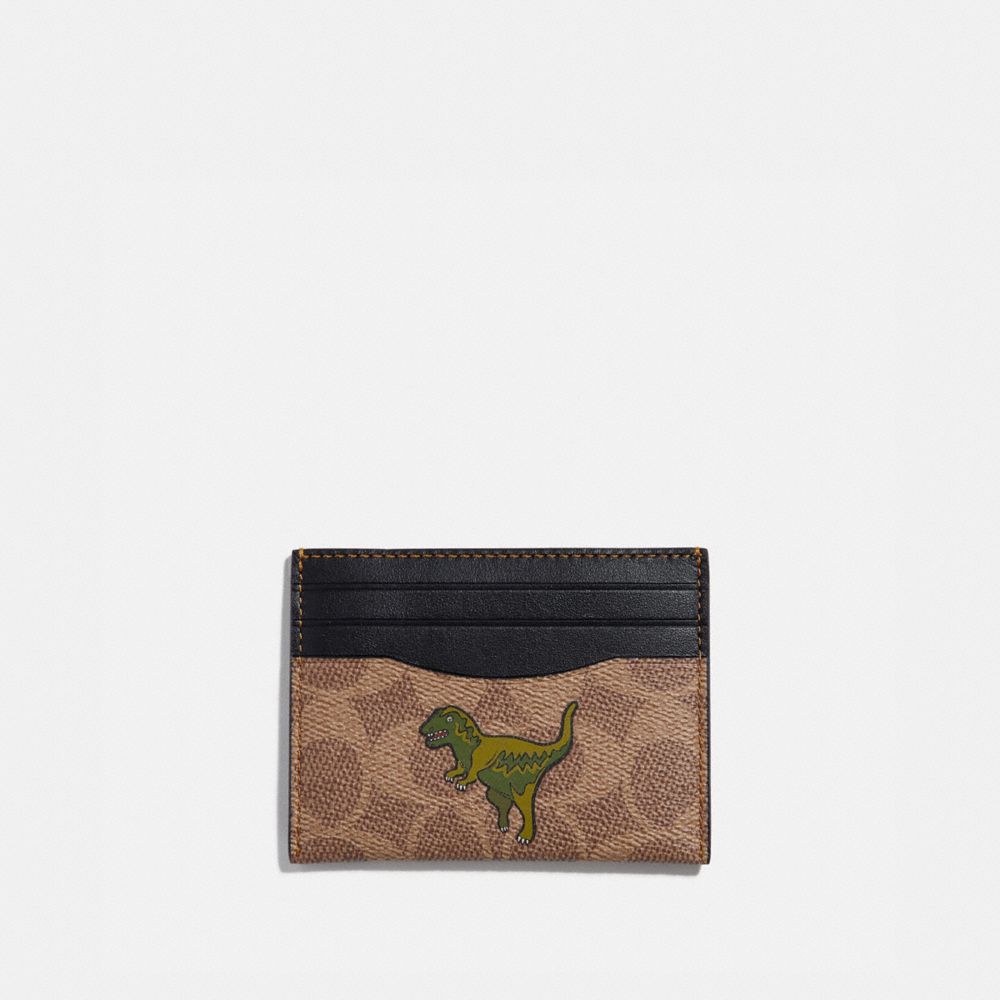 coach dinosaur card holder