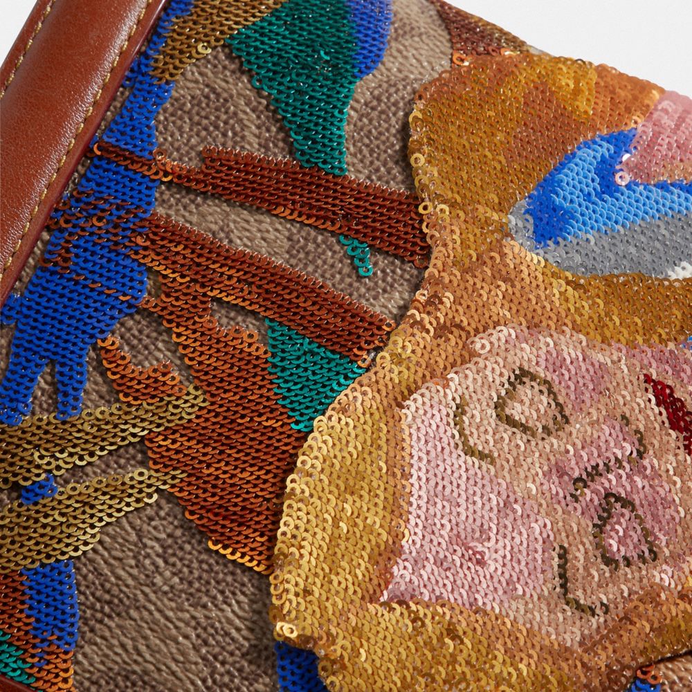 alice in wonderland coach purse