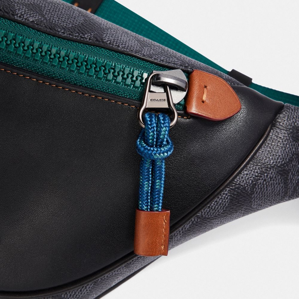 disney x coach signature rivington belt bag with dumbo