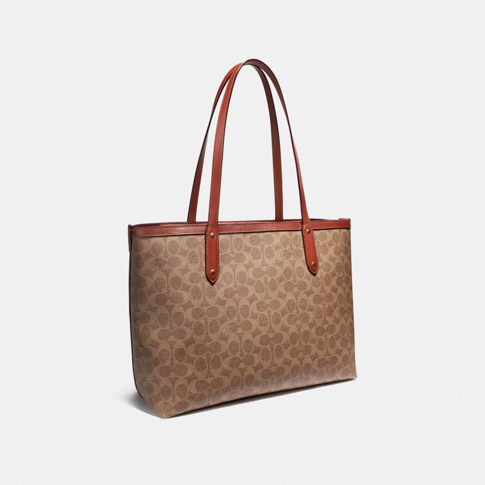 coach zip top tote in signature canvas