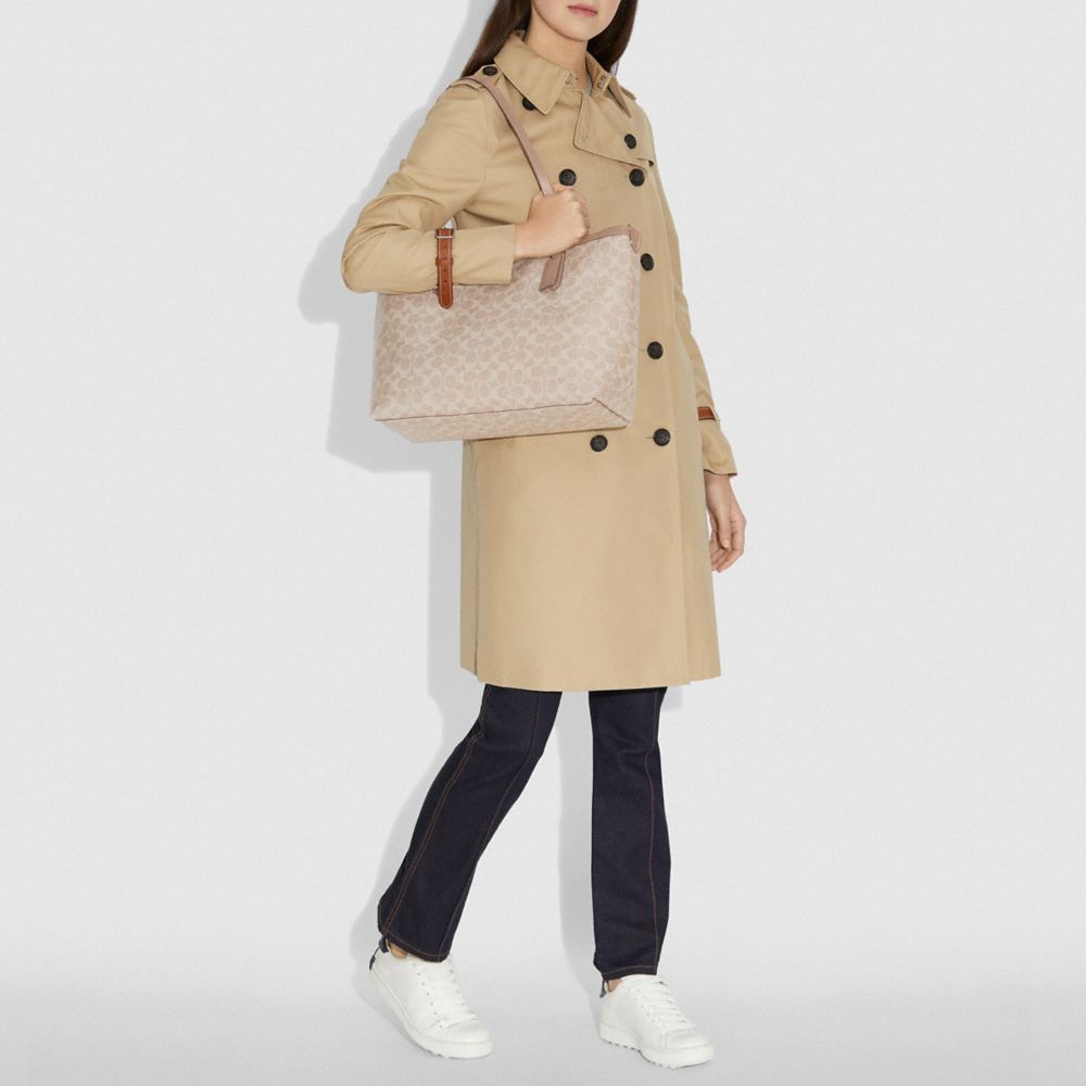 coach zip top tote in signature canvas