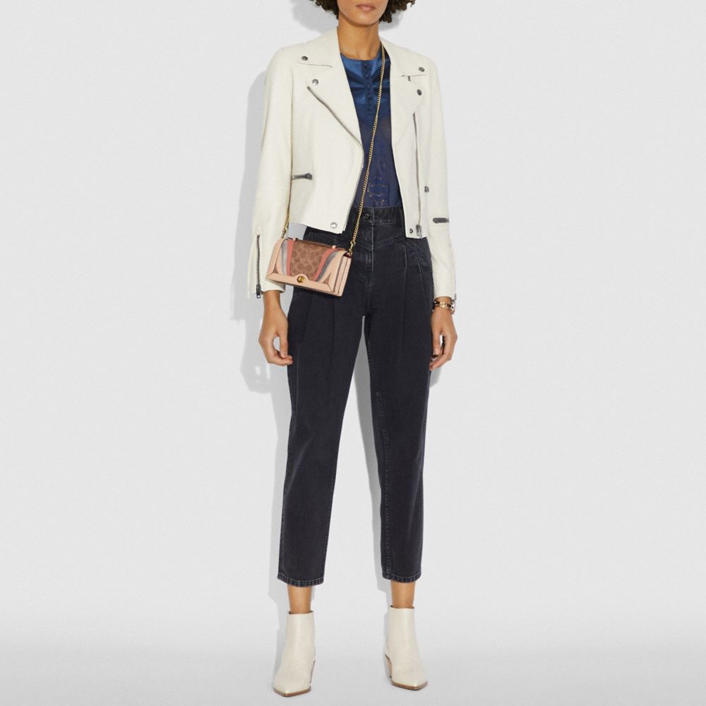 riley chain clutch coach