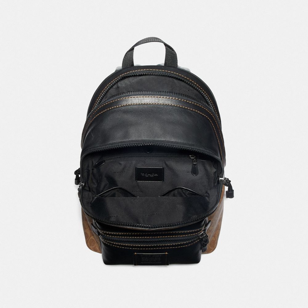 COACH Academy Backpack In Signature Canvas With Rexy By Yeti Out