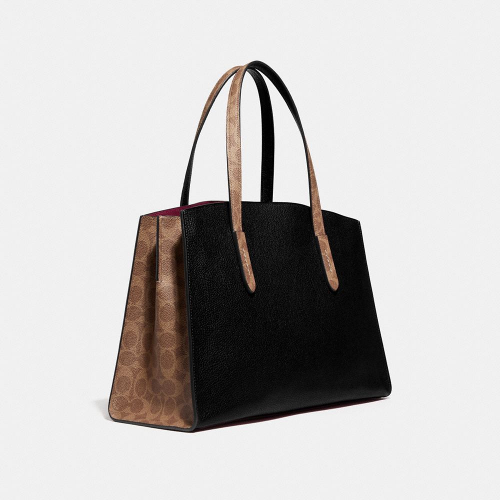 coach charlie carryall in signature canvas