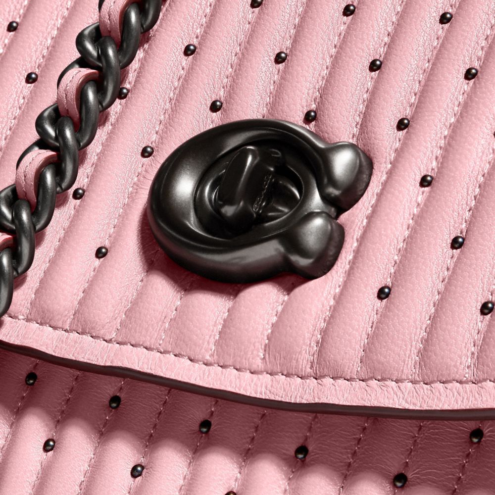 coach parker quilted with rivets