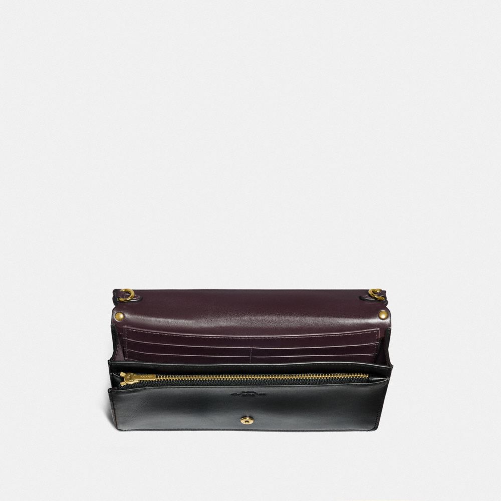 hayden foldover crossbody clutch with rivets