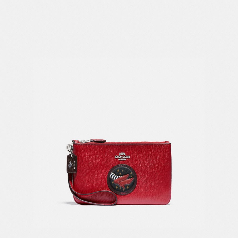 coach wizard of oz wristlet