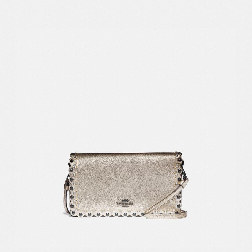 hayden foldover crossbody clutch with rivets