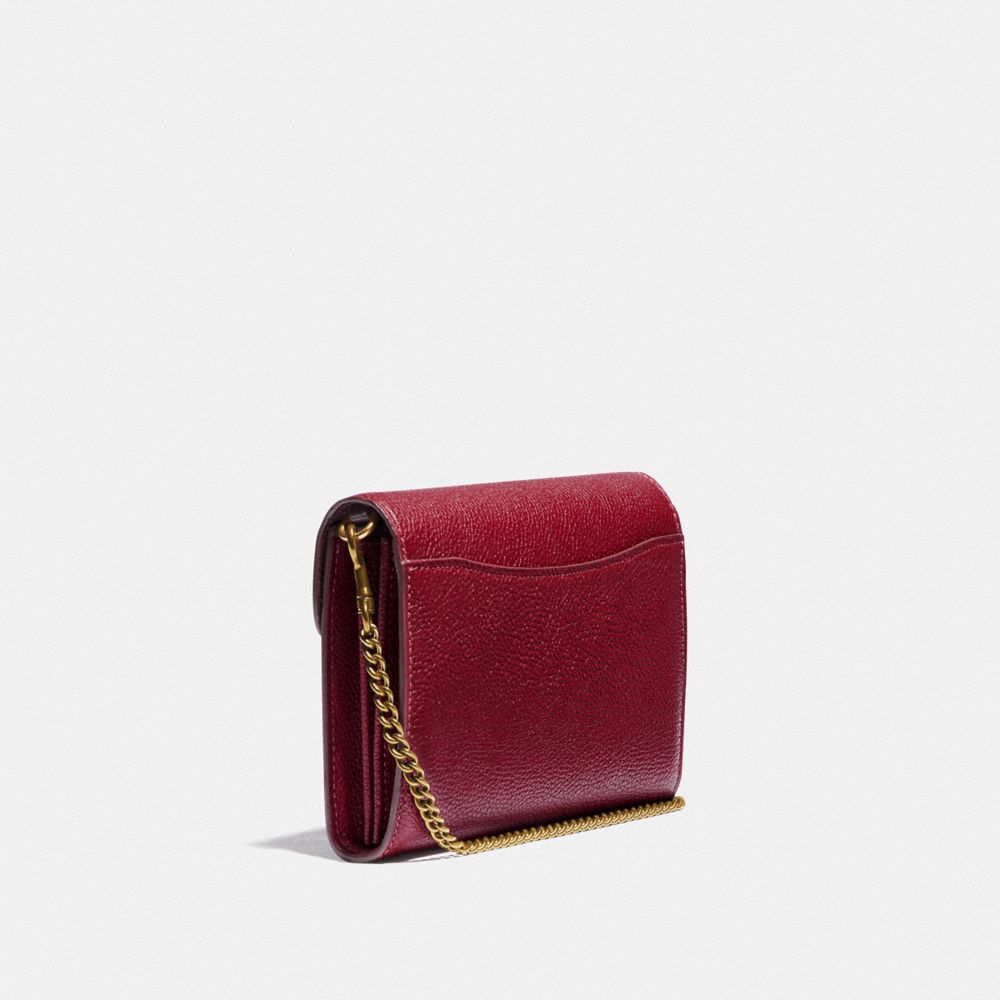 deep red clutch bag