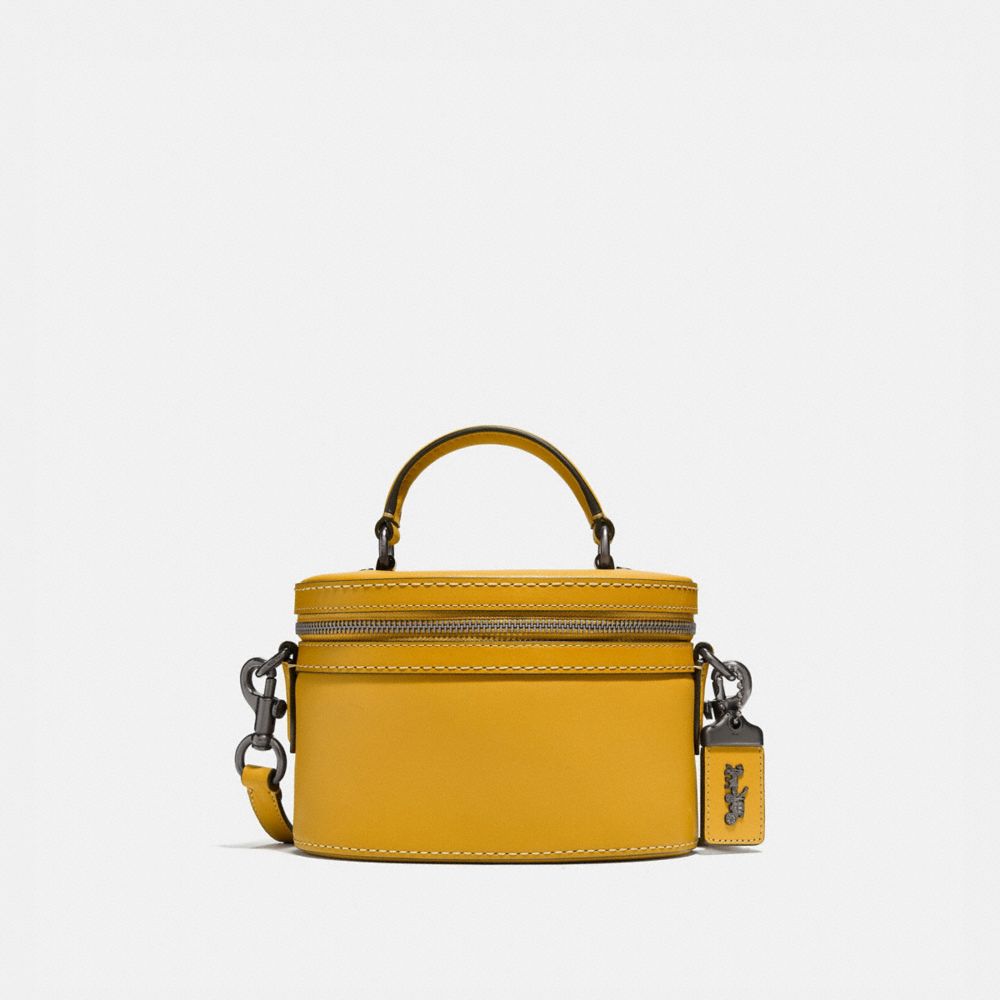 mustard coach purse